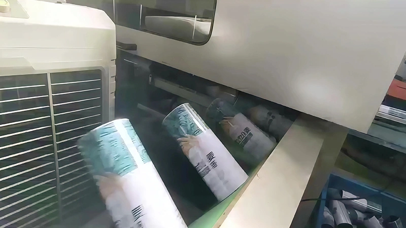 Volteador rotativo de cuerpos de lata