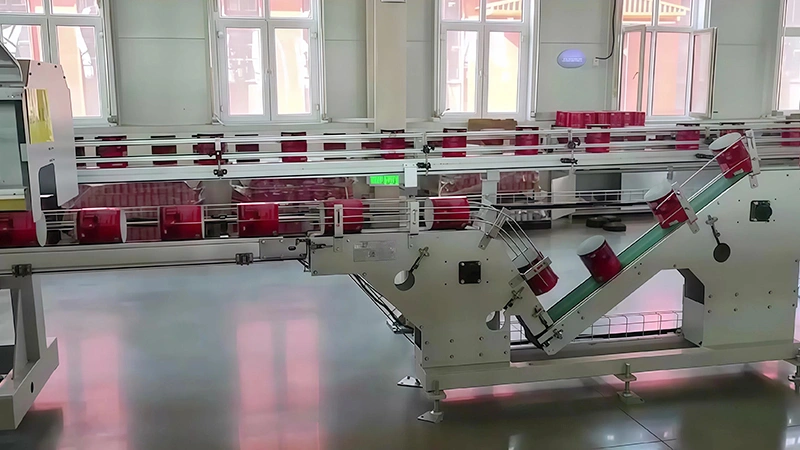 Volteador de latas tipo V