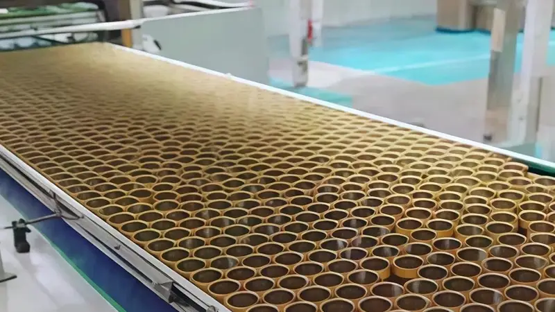 Paletizador de latas vacías con carga automática de separadores por capa