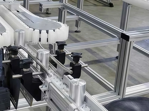 Transportador de sujeción lateral