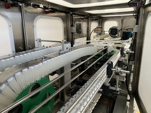 Enjuagadora de botellas con aire ionizado y sujeción por pinzas